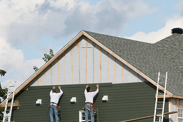 Professional Siding Contractor technician working in Delmont, PA